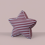 Star-shaped floor cushion for kids featuring bold vertical light blue, burgundy, and white stripes. Large Superstar Crash Pad on a neutral studio background.